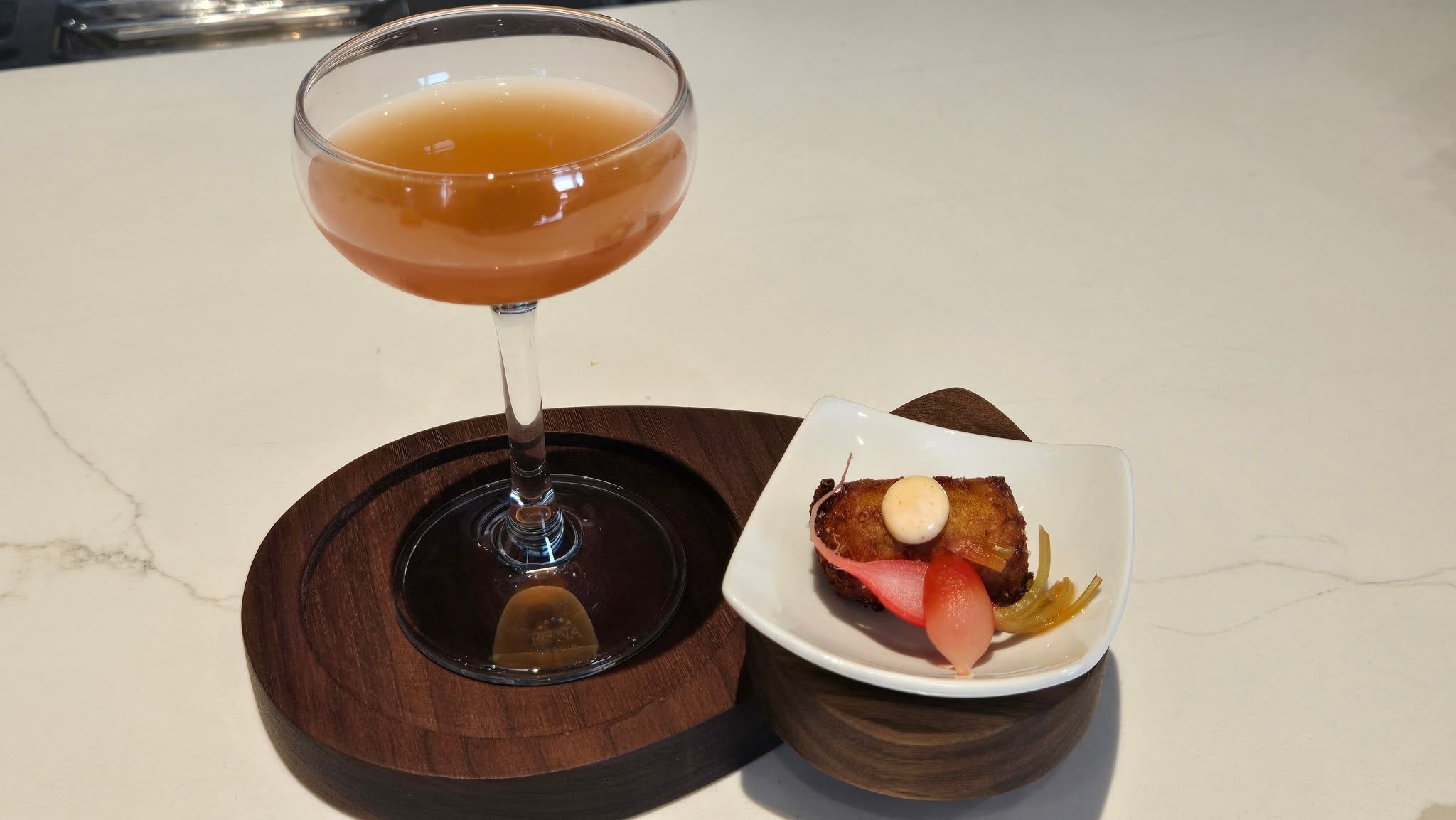 Stemmed Coupe Cocktail Paired with Crispy Savory Amuse-Bouche on Custom Walnut Pedestal