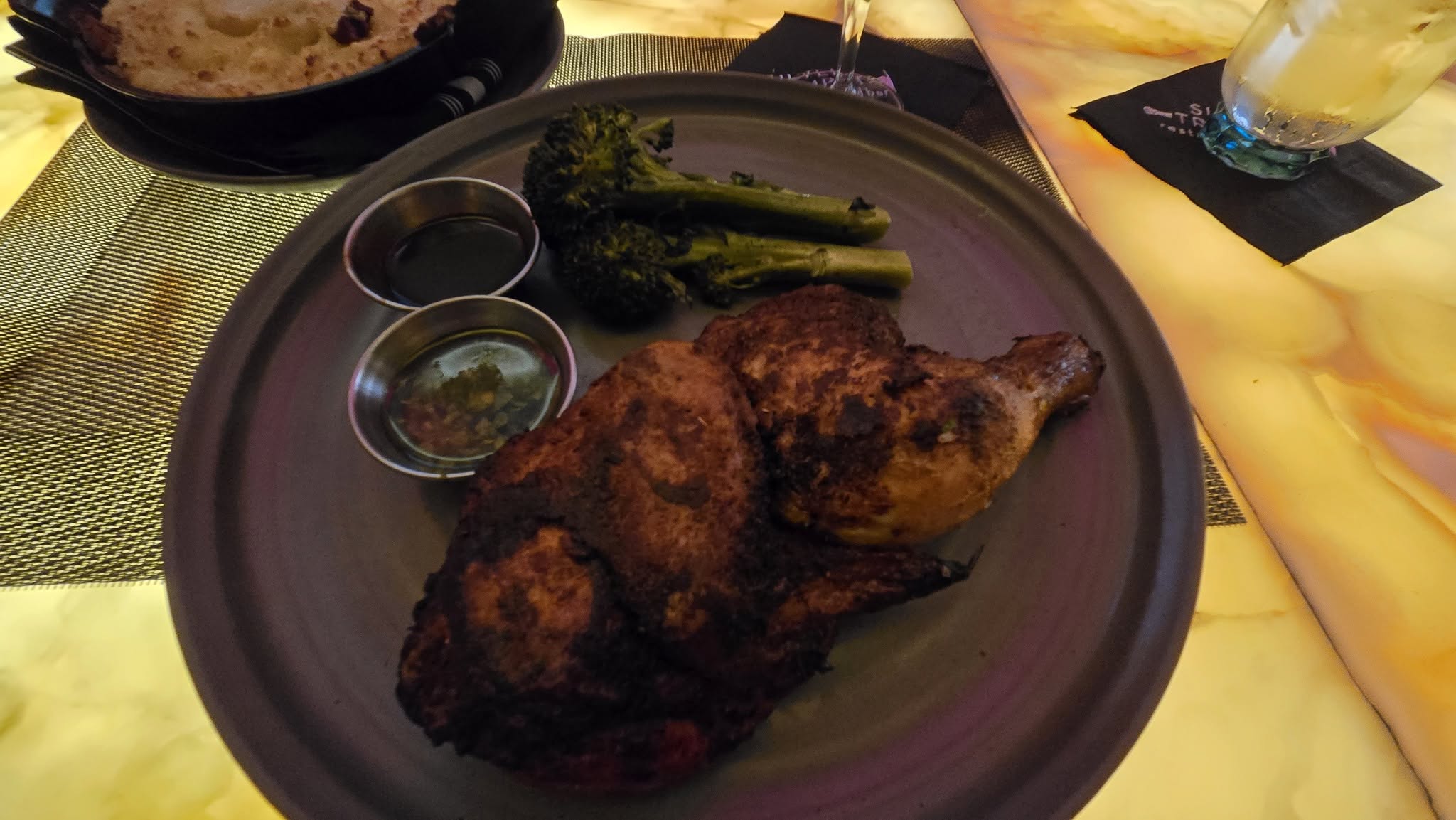 Silver Trumpet Restaurant Split Roasted Chicken with Grilled Broccolini