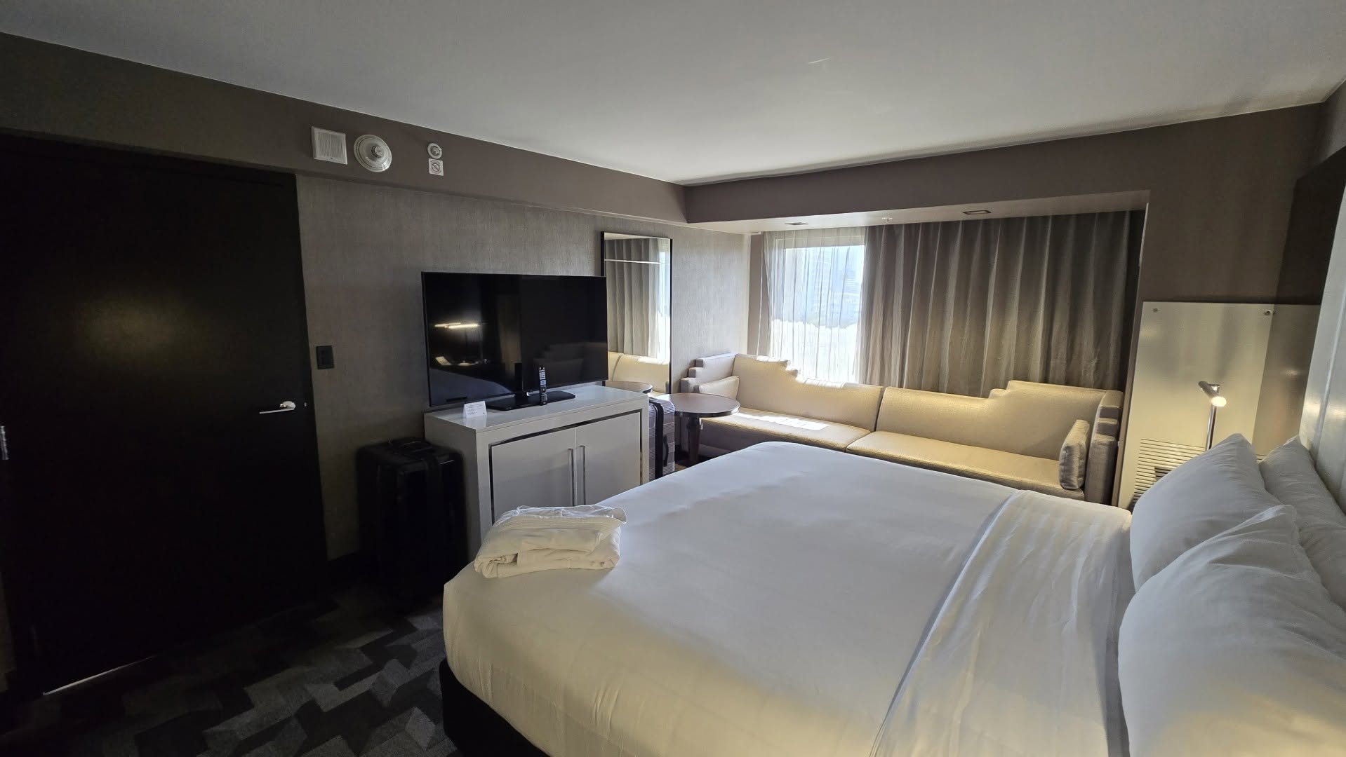 Plush King Bed with folded waffle bathrobe