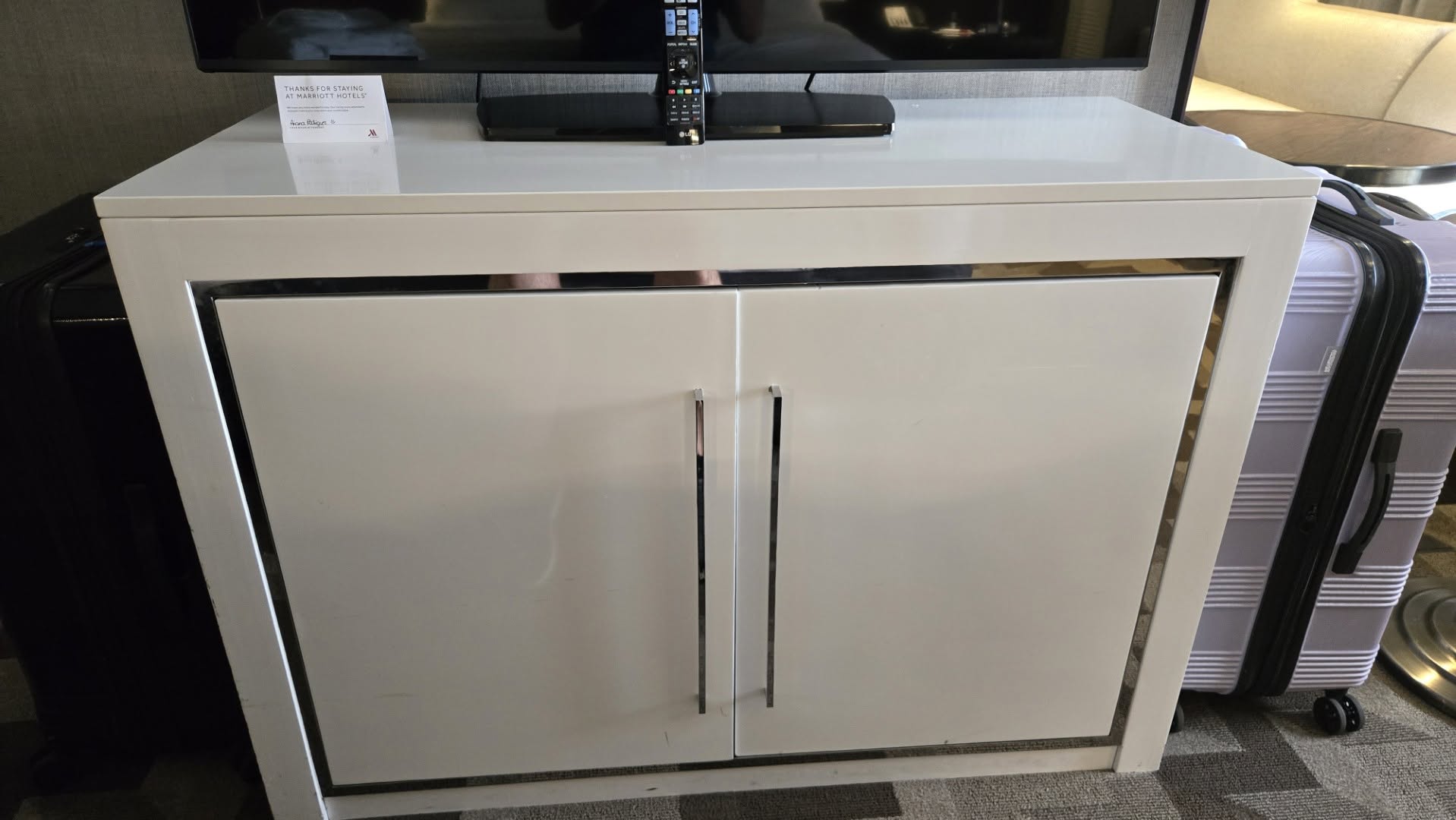 Entertainment credenza with room attendant welcome card