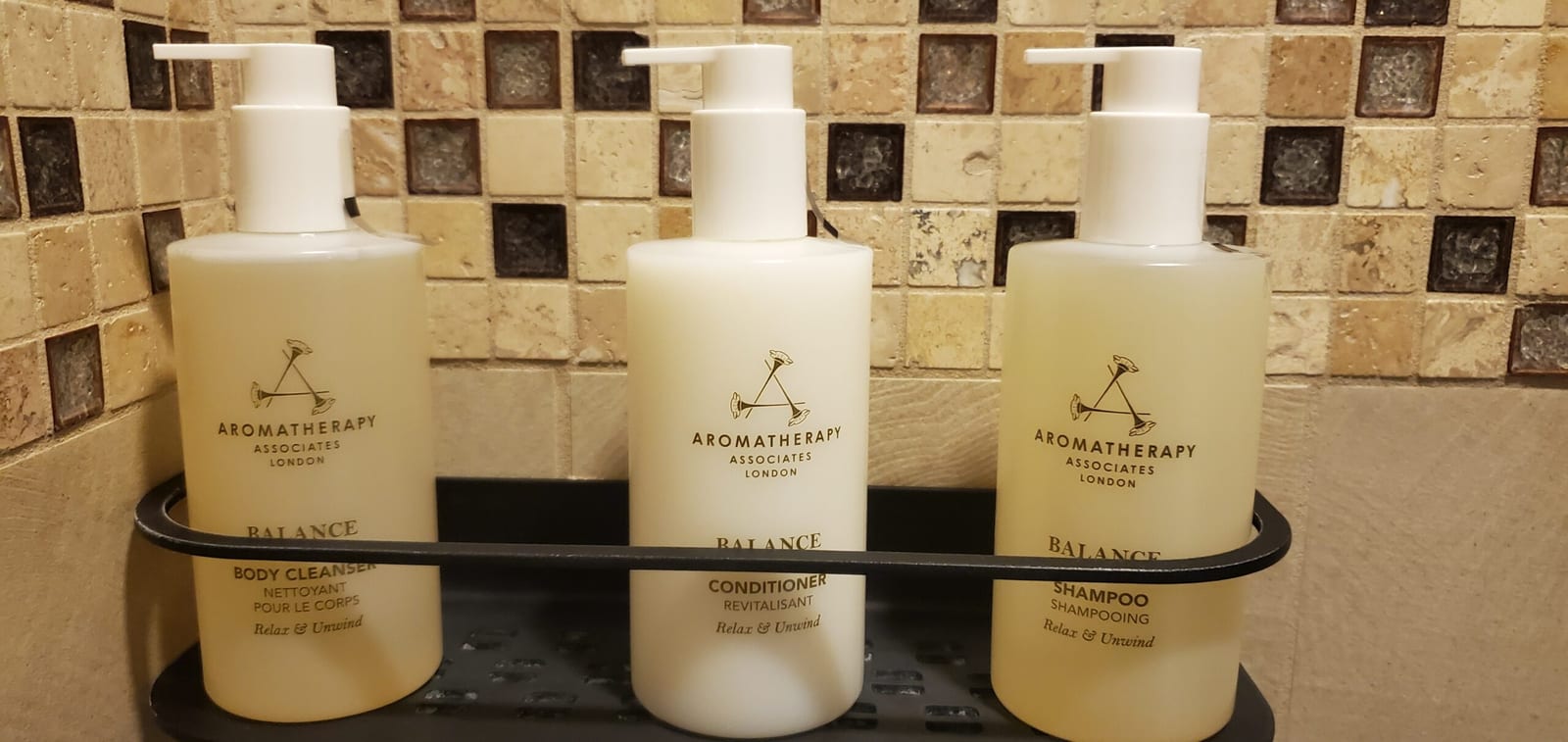 Aromatherapy Associates London 'Balance' body cleanser, shampoo, and conditioner. Aromatherapy Associates London Balance bath amenities in the shower
