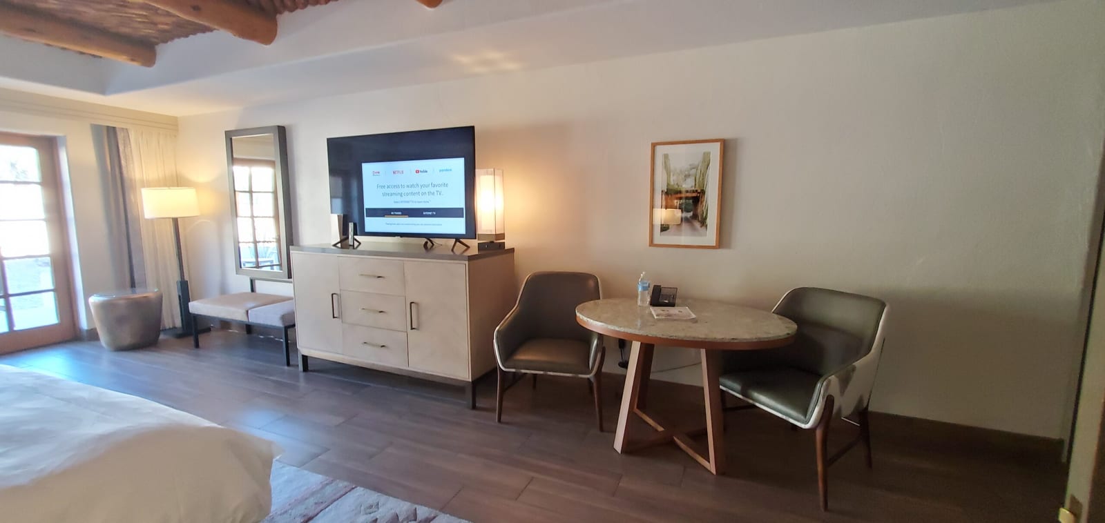 Entertainment credenza and hardwood dining table set for in-room dining or productivity. Media credenza and dining table in Casita #287